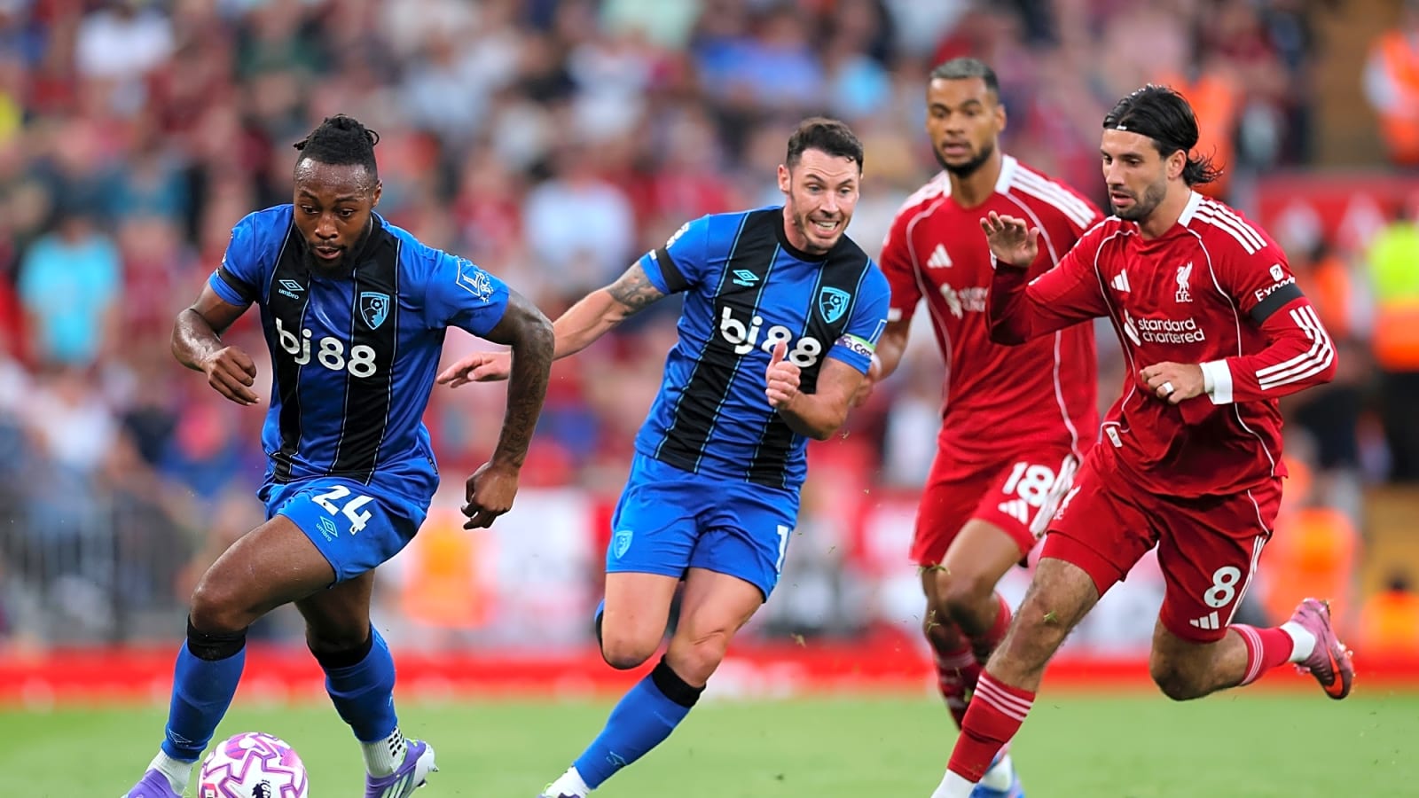 Anthony Taylor pauses play during Liverpool v Bournemouth after Antoine Semenyo racist abuse incident