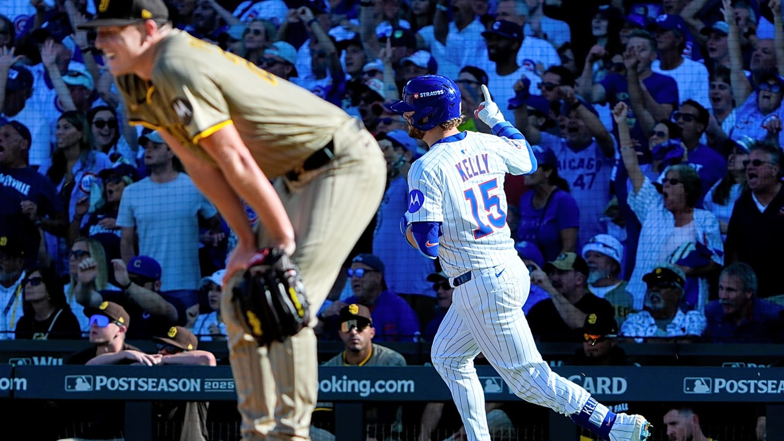 Chicago Cubs catcher Carson Kelly rounds the bases after hitting a solo home run