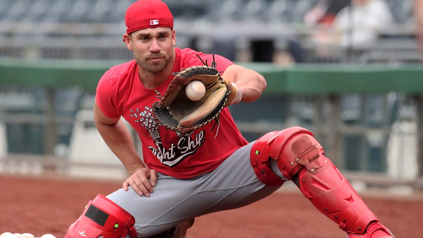 Athletics get help at catcher from the Reds