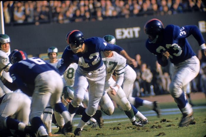 Y.A. Tittle (New York Giants): Charlie Conerly