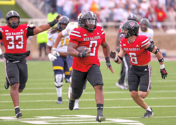 College Football: Gill-Howard takes it to the house