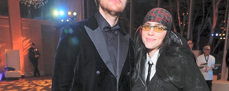 Finneas says he's happy to be 'riding the coattails' of sister Billie Eilish as he reflects on their musical journey