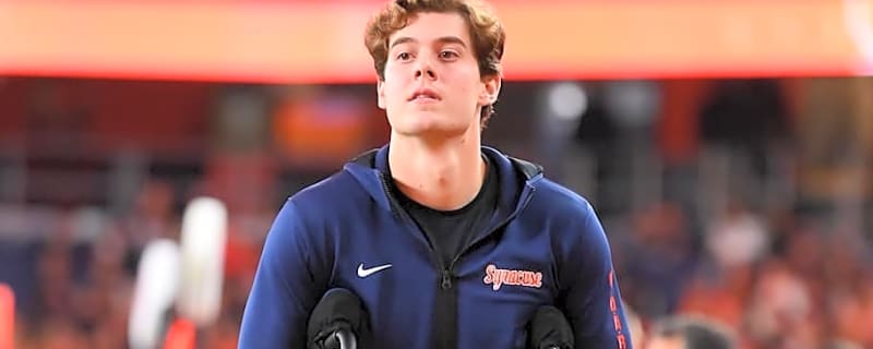 Notre Dame Players Embrace Former Quarterback After Historic Win