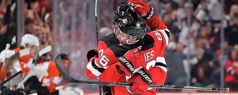 Jack Hughes's first goal of the season ends their home opener with a win and a throwback celebration