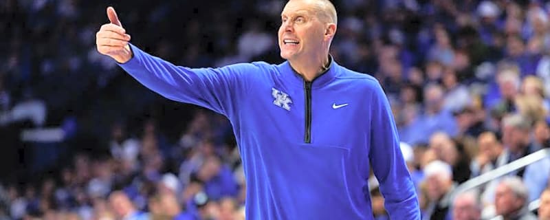 ESPN picks the winner between the Kentucky Wildcats and Louisville Cardinals
