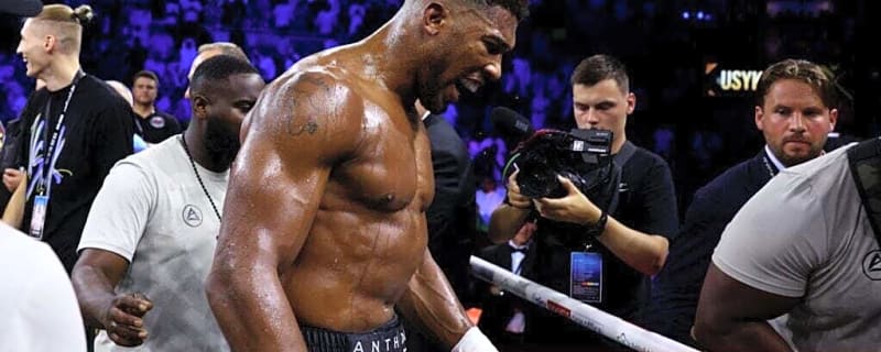 Anthony Joshua squared up to Oleksandr Usyk’s team after throwing belts out of ring in controversial rage