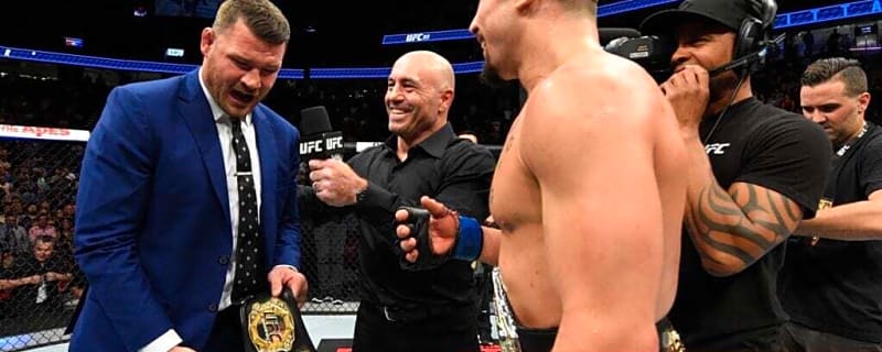 UFC champion threw his title on the floor after Robert Whittaker and Yoel Romero saved the UFC with Fight of the Year contender