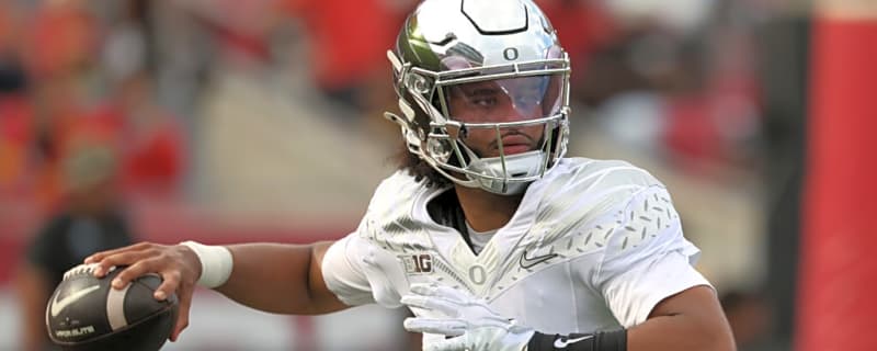Dante Moore Carted Off Field After Scary Hit Against USC