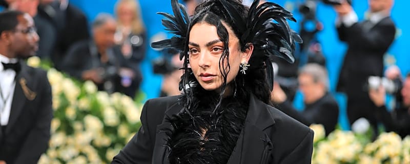 Charli XCX Appears to Clap Back at Taylor Swift During Surprise &#39;SNL&#39; Cameo