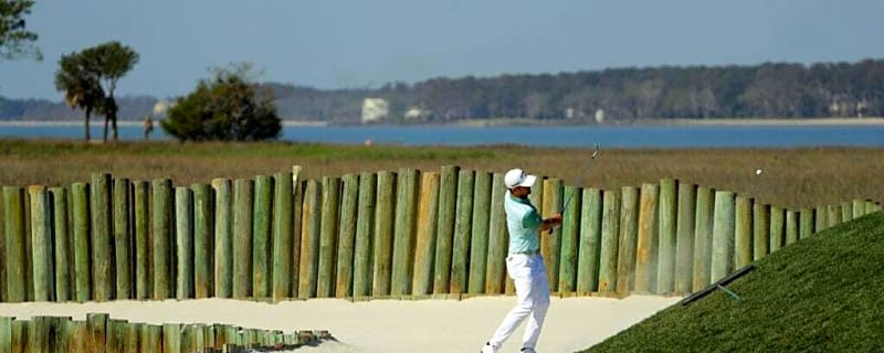 A PGA Tour winner once shot a course record with an NFL player as his caddie