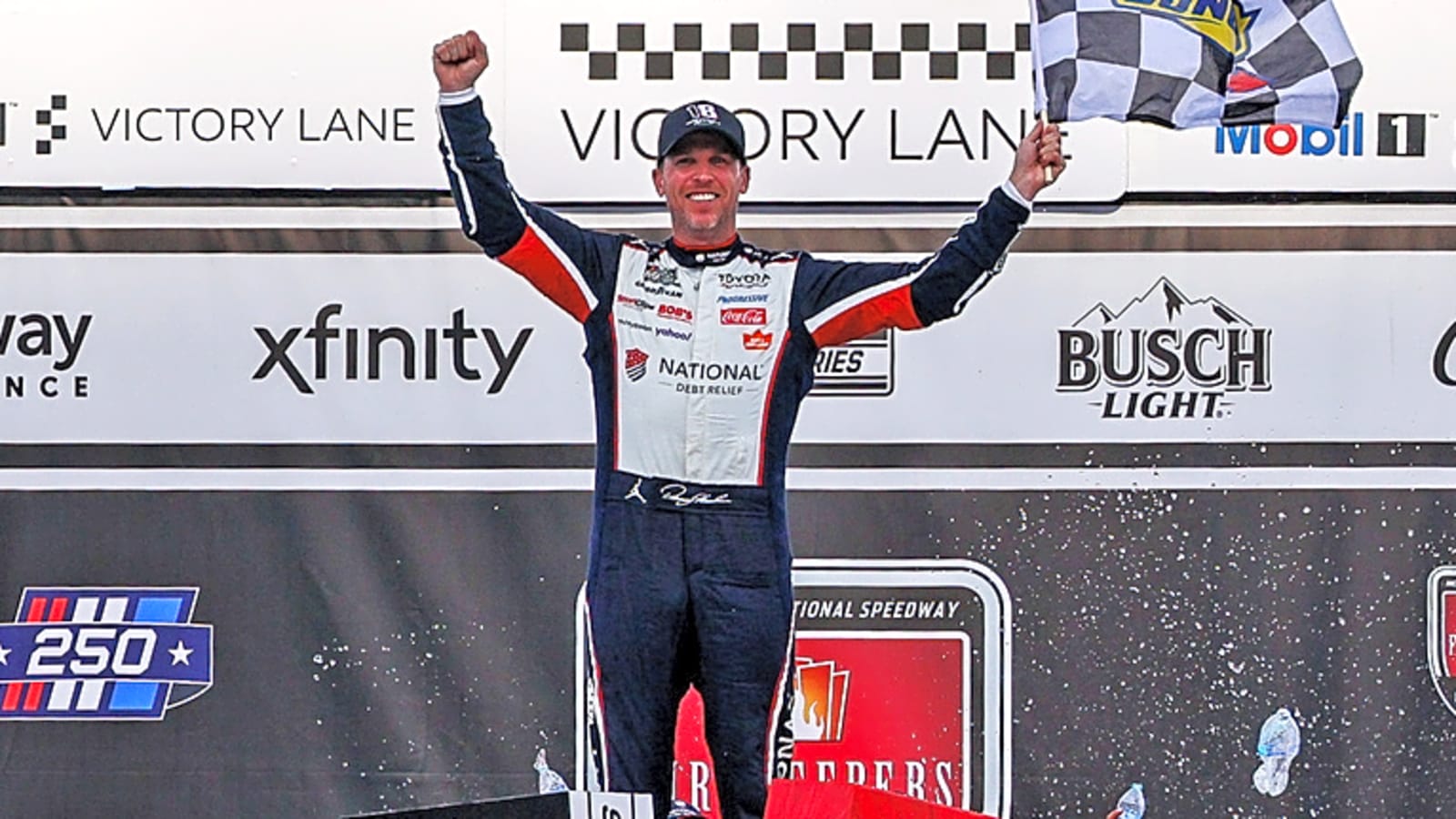 Emotional Hamlin wins NASCAR Cup race at Michigan, honors Busch