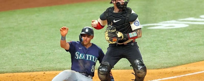 Mariners give up lead, but outlast Rangers in 12