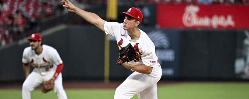Three Cardinals hurlers combine to blank reeling Reds