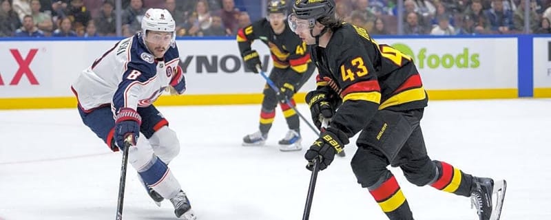 Quinn Hughes takes on Zach Werenski as Canucks host Blue Jackets