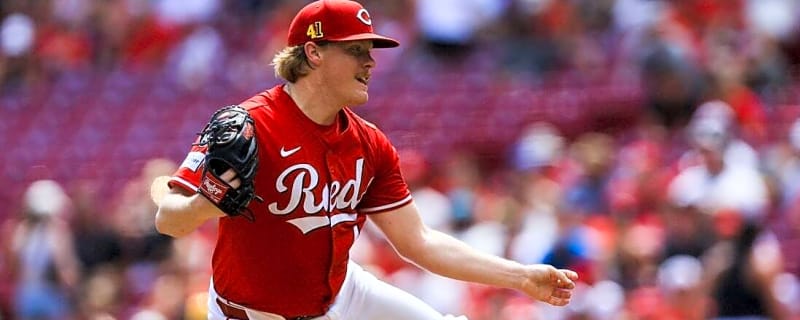 Reds snap Brewers&#39; winning streak in extras