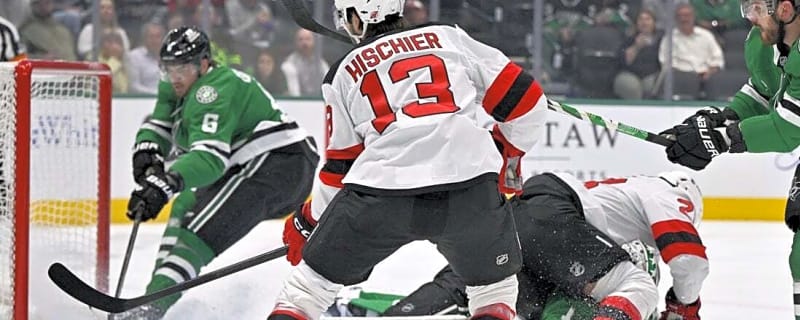 Connor Hellebuyck wins Devils debut, stopping 16 saves to beat Stars