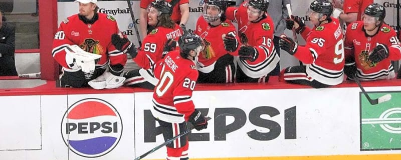 Blackhawks score five straight to beat Sharks in season finale