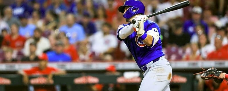Cubs come through in late innings, top Reds