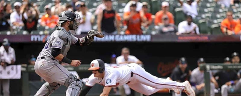 Rockies DFA C Austin Nola, recall RHP Chase Dollander