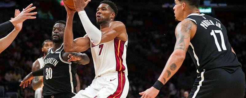 After blockbuster trades, new-look Heat and Wolves clash in Miami