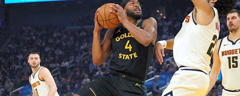 Short-handed Warriors use late surge to upend Nuggets