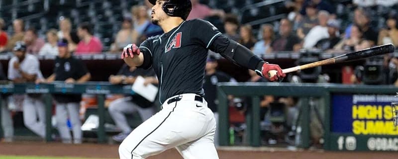 Behind Nolan Arenado's grand slam, D-backs demolish Rockies