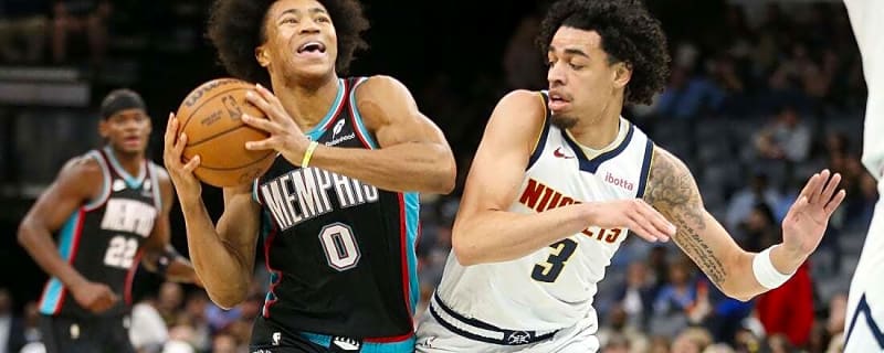 Grizzlies surprise Nuggets with gritty defense late