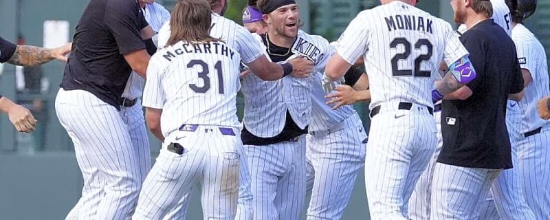 Rockies rally twice to drop Orioles in extras