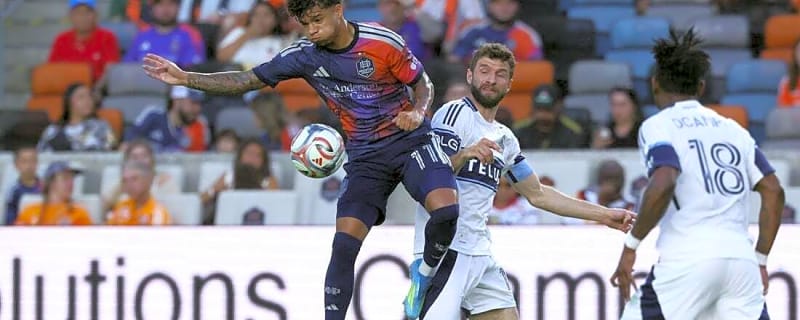 Guilherme scores in final minutes as Houston stuns 10-man Vancouver