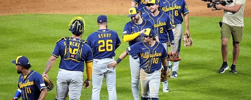 Stifled through 8, Brewers erupt late to sink Rockies in 10
