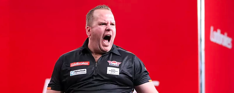 Dirk van Duijvenbode hits nine-dart finish during Players Championship 21 in Leicester