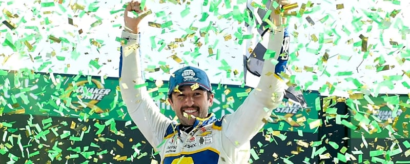 Kevin Harvick reacts to emotion shown by Chase Elliott following Atlanta win