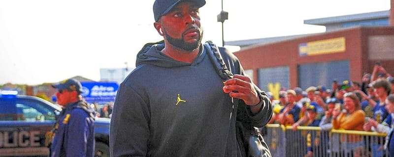 Michigan’s Sherrone Moore still rocking blue-collar jacket after beating Washington