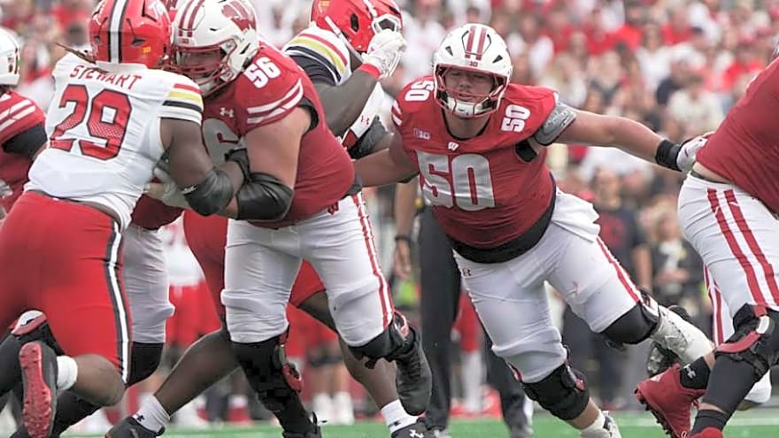 Wisconsin football merry-go-round OL crushing the offense