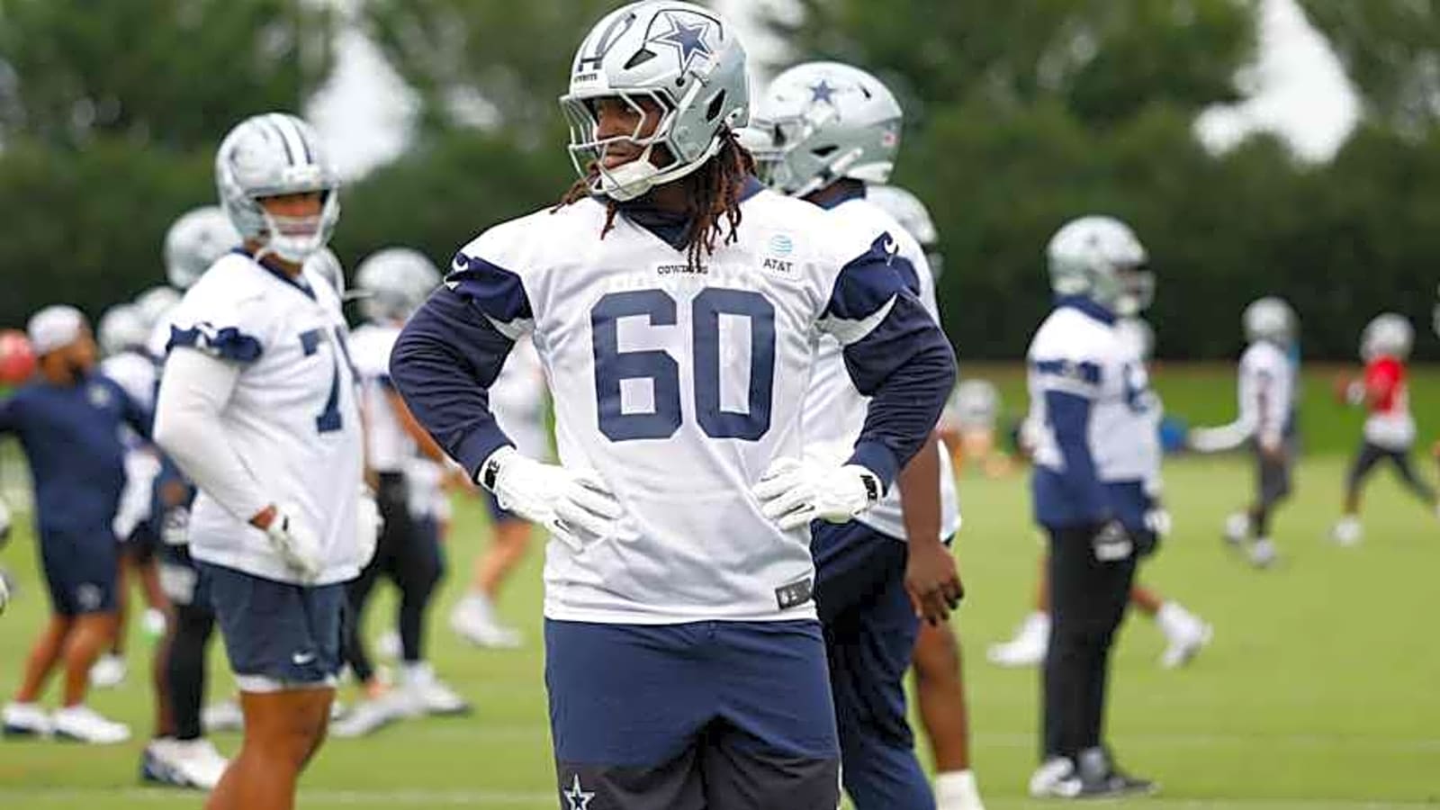 Cowboys’ scrutinized starter won’t let monsoon stop him from honing his craft