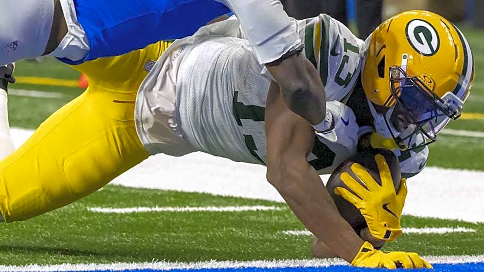 Packers’ Unlikely Hero Had One Shoe, Hands of Glue