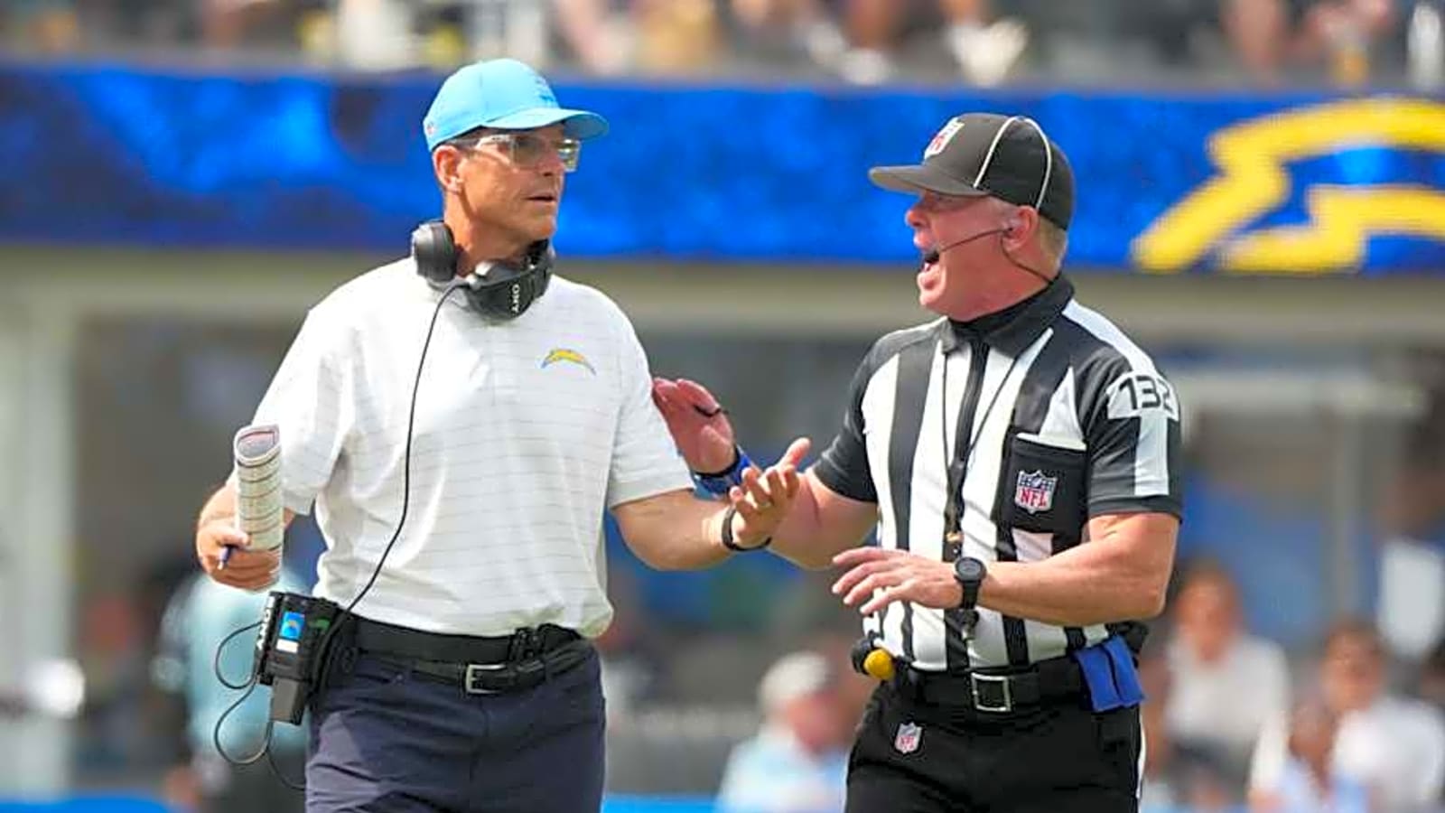 Chargers&#39; Jim Harbaugh reacts to Michigan scouting scandal punishment