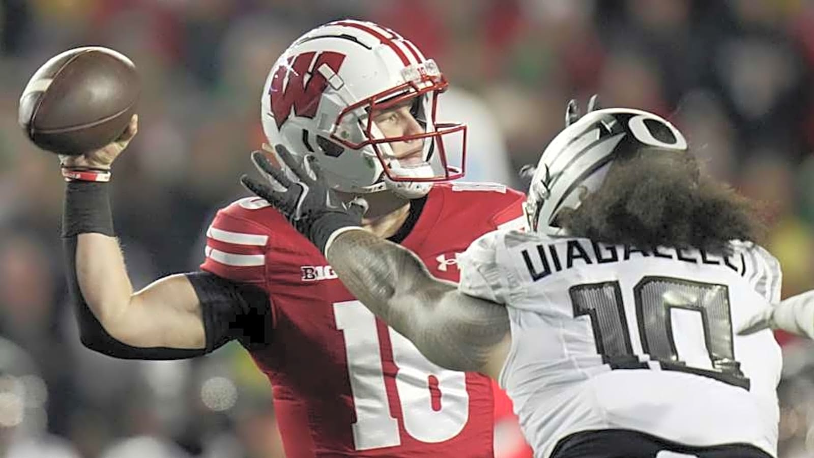 Expert picks for Wisconsin at Oregon: Blowout coming, but Badgers could cover massive spread