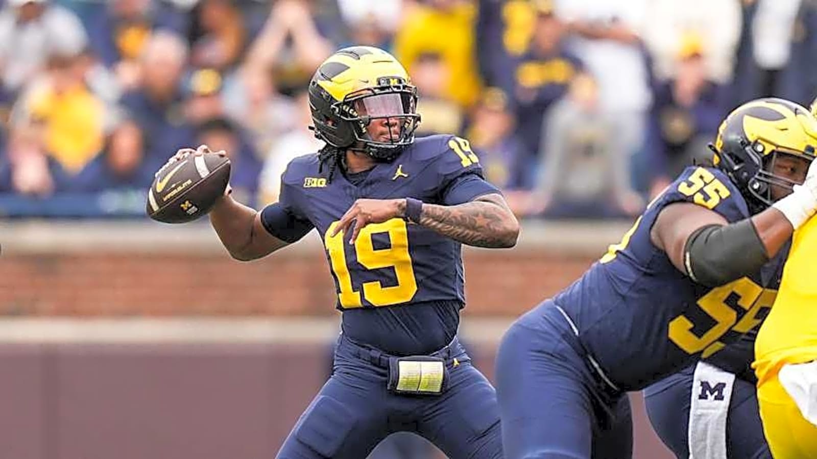 Star Michigan QB Uses Lucrative NIL Deal To Give Back in Awesome Gesture
