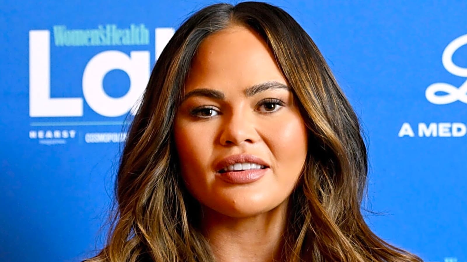 Chrissy Teigen Explains Selfie of Her Bandaged, Swollen Face