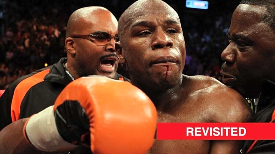 Floyd Mayweather Jr. was held back by team after almost starting fight with interviewer following controversial win