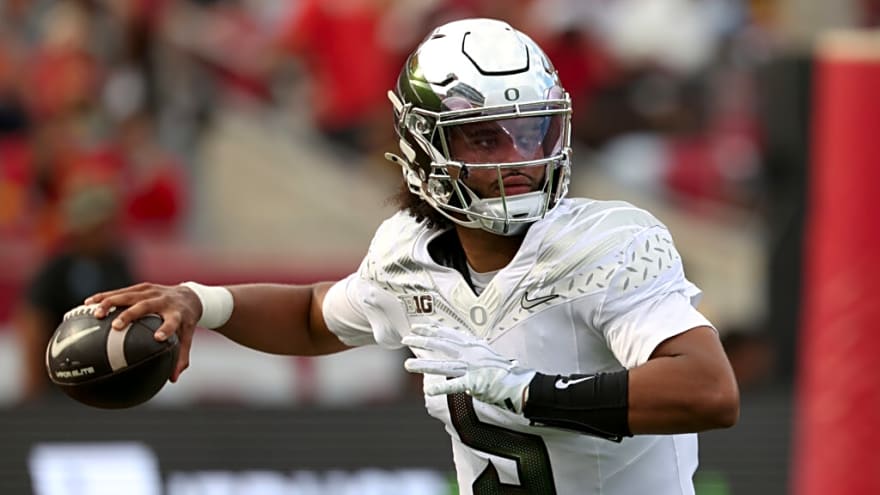 Dante Moore Carted Off Field After Scary Hit Against USC