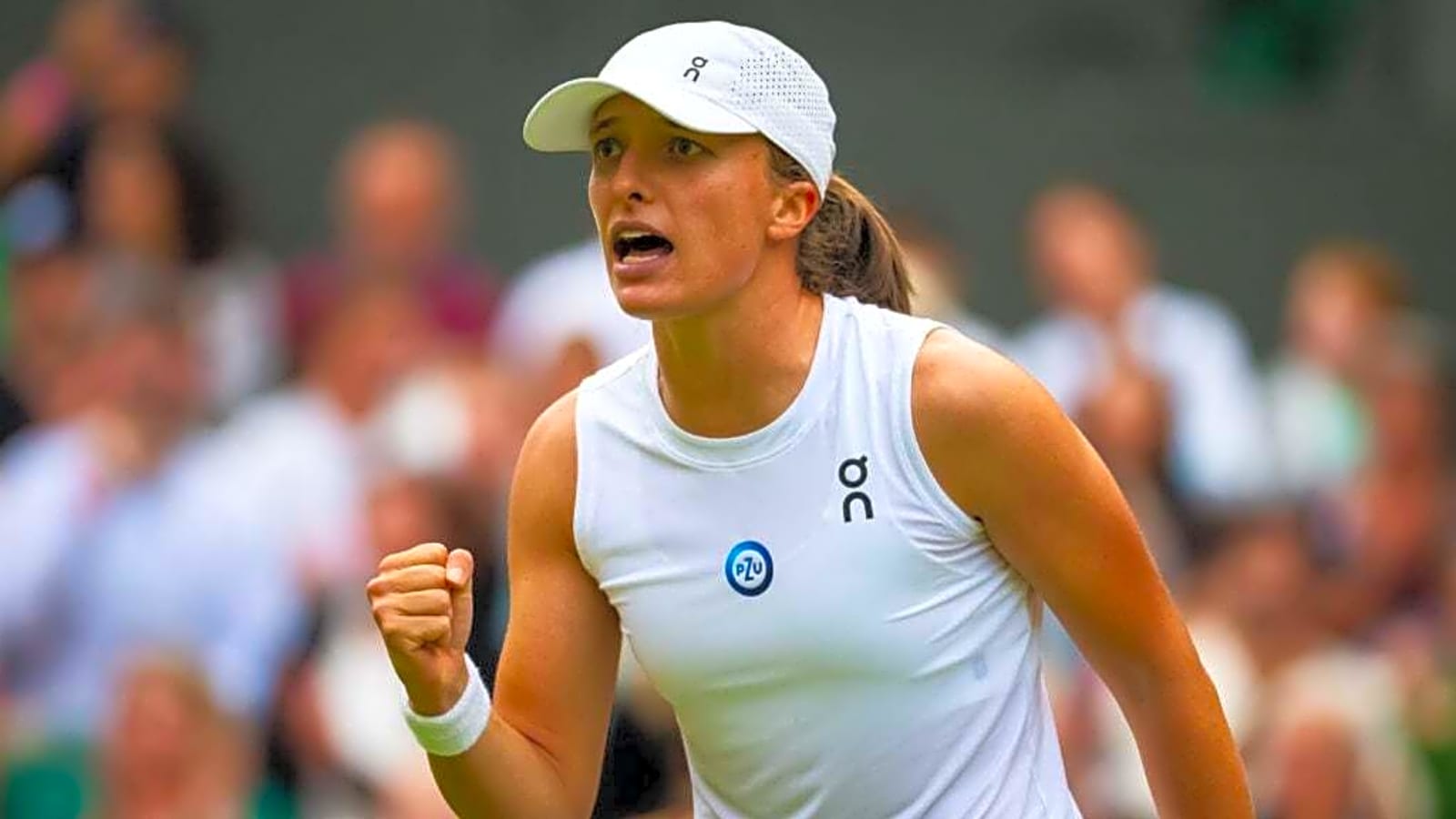 Iga Swiatek explains why she pulled out her phone straight after winning the Wimbledon title