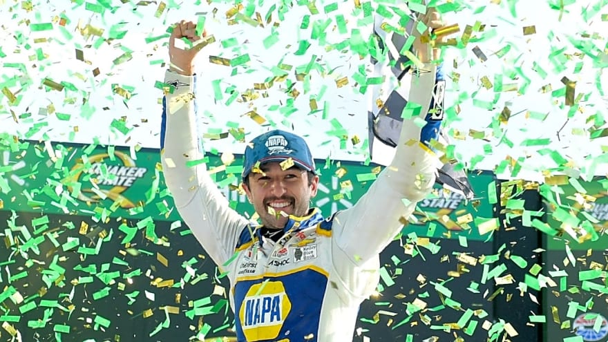 Kevin Harvick reacts to emotion shown by Chase Elliott following Atlanta win
