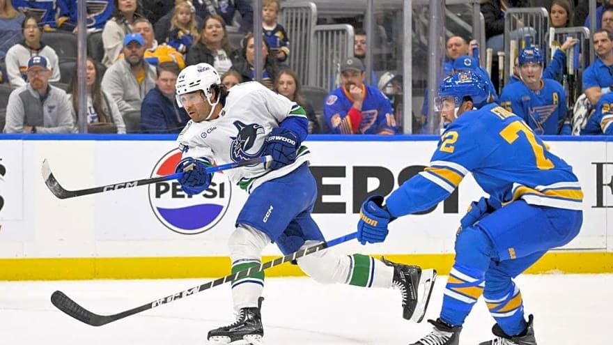 Kiefer Sherwood nets hat trick as Canucks edge Blues in shootout