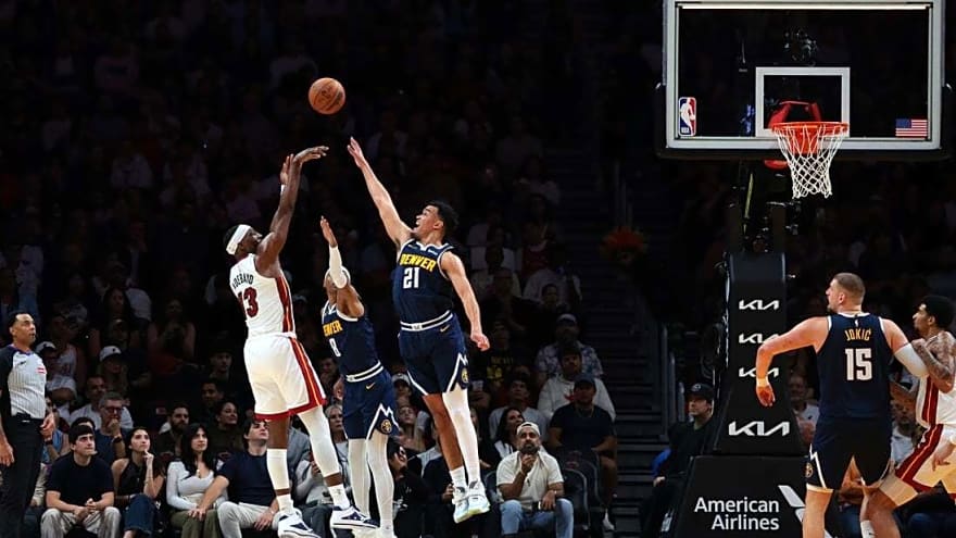 Nikola Jokic exits with knee injury as Heat handle Nuggets