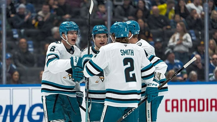 Sharks start fast, cruise past struggling Canucks