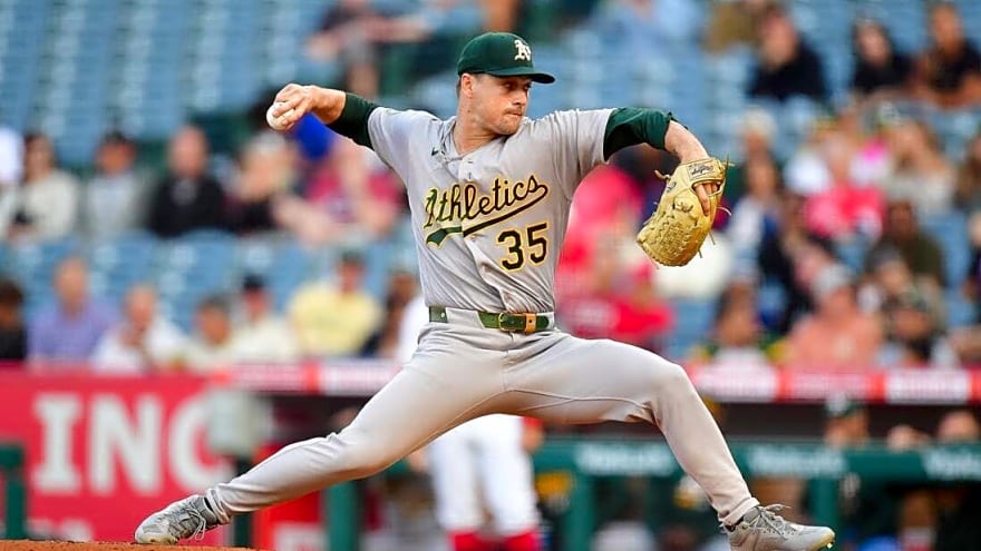Angels, held hitless for eight innings, stun A's, J.T. Ginn