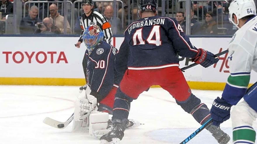 Jackets build 3-goal lead, hand Canucks 9th straight loss