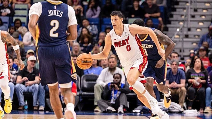 Short-handed Heat stave off rally to beat Pelicans